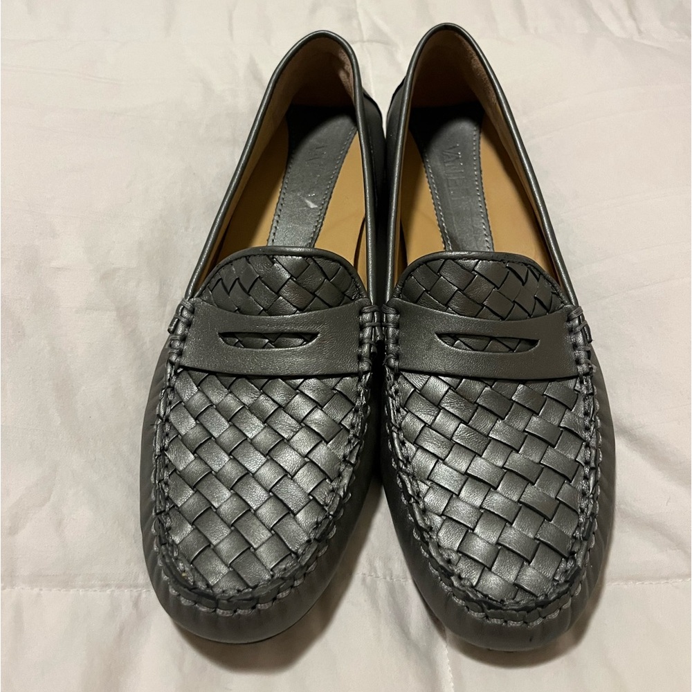 A moc-stitched toe and woven vamp updates a well-cushioned footbed for comfort